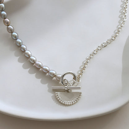 Close-up of Half Pearl and Silver Belcher Chain Fan T-Bar Necklace with personalised pendant.
