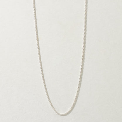 Full-length Spiga Chain Necklace in silver, available in 16, 18, and 20 inches.