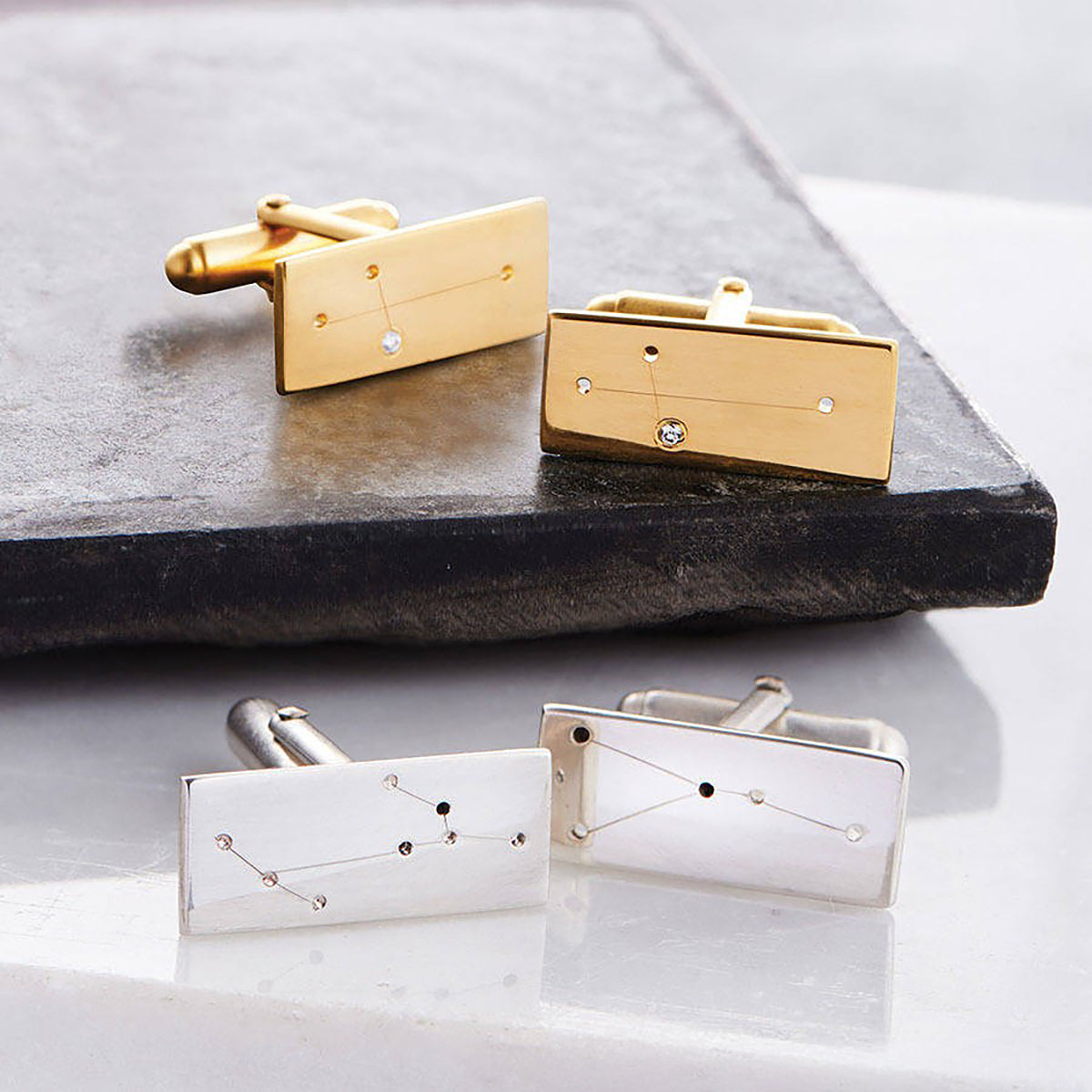 Luxury 9ct Gold and Silver Constellation Cufflinks, handcrafted with diamond accents.
